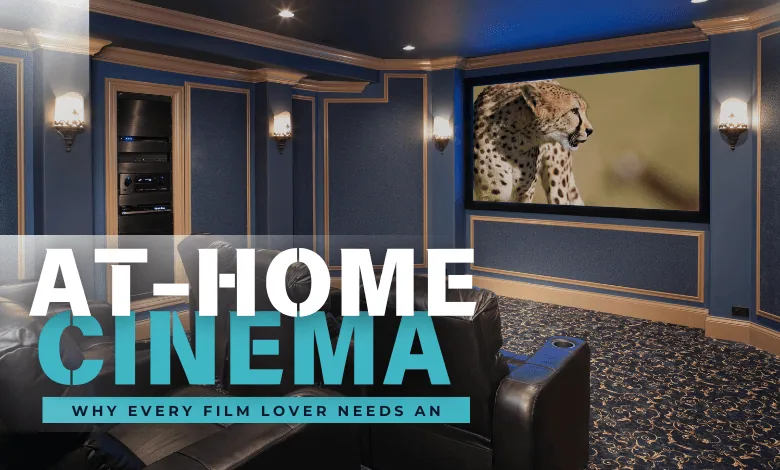 A sophisticated home cinema with plush seating faces a large screen displaying a cheetah. Elegant sconces flank the screen in a richly colored room with paneled walls.