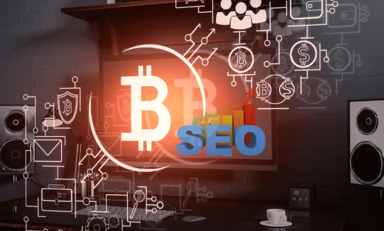 A digital workspace with a computer monitor displaying a Bitcoin symbol and the word "SEO," surrounded by marketing and blockchain icons.